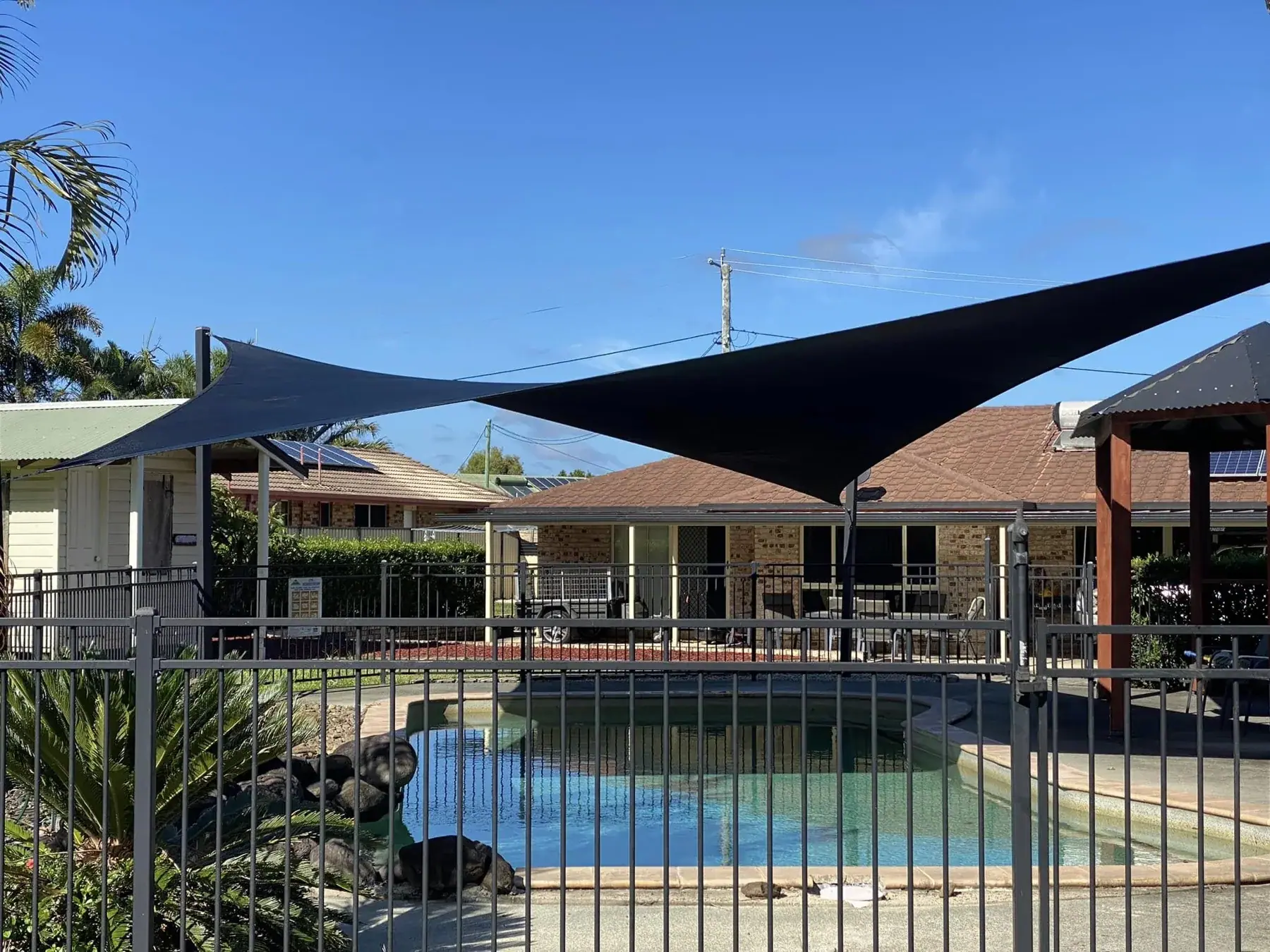 Room for good afternoons. Full view of the completed pool shade sail.